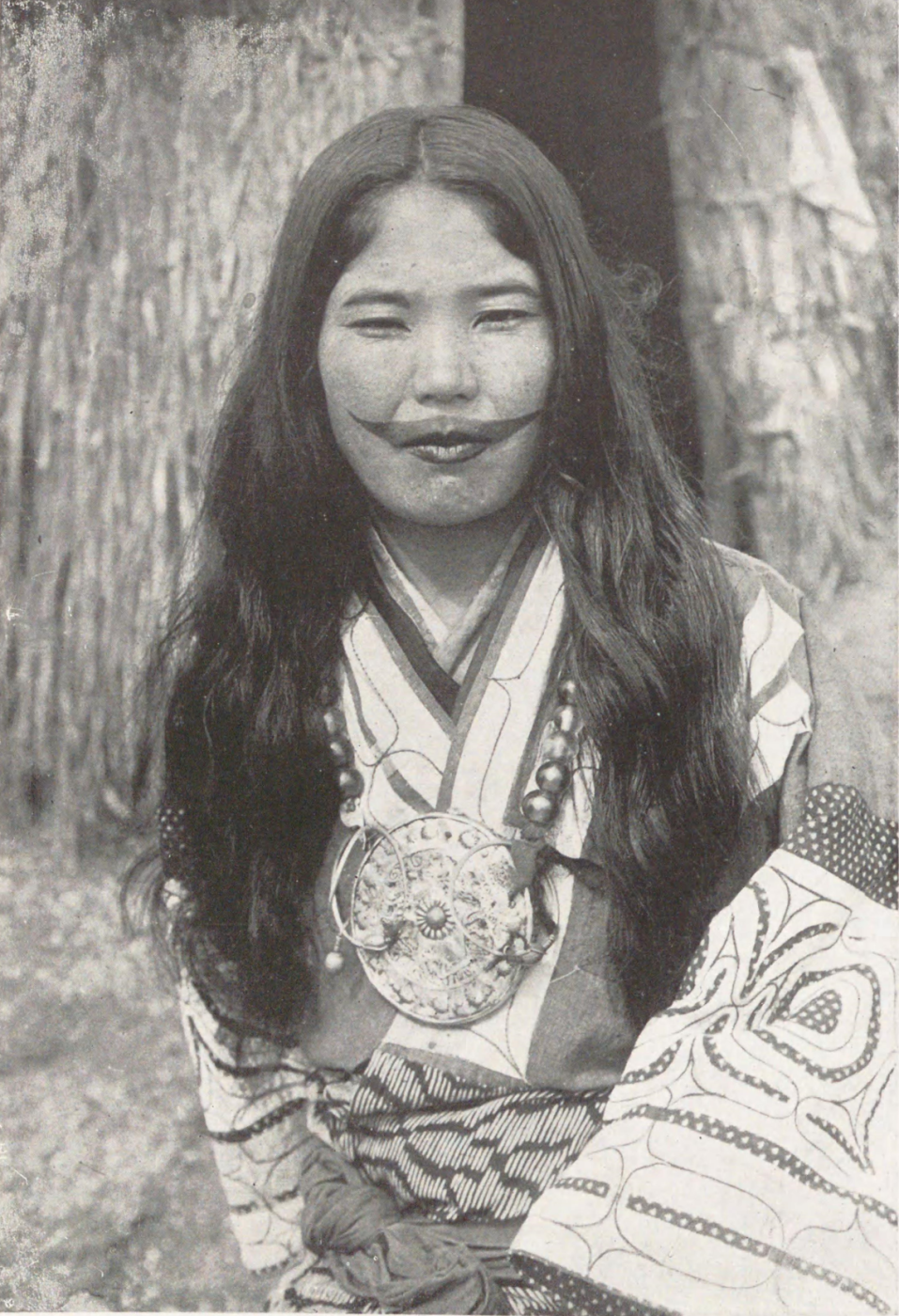 Ainu_woman_from_a_book_Published_in_1931_P81